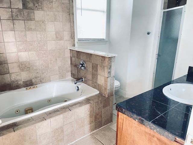 109 E Wheeler St S, Manor, TX 78653 - full bathroom with a shower stall, a whirlpool tub, tile patterned flooring, and vanity