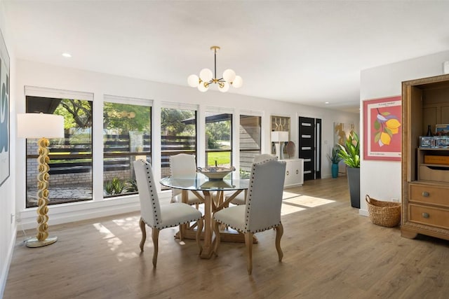 105 Palos Verdes Dr, Lakeway, TX 78734 - dining room with a chandelier, light wood-style floors, and recessed lighting