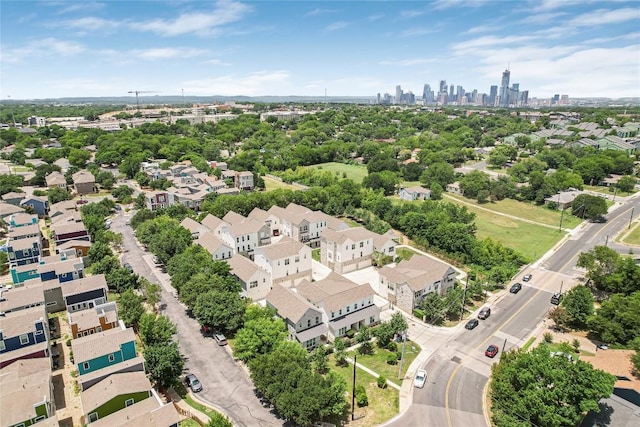 2624 Metcalfe Rd Unit 17, Austin, TX 78741 - drone / aerial view of city skyline and a tree filled landscape
