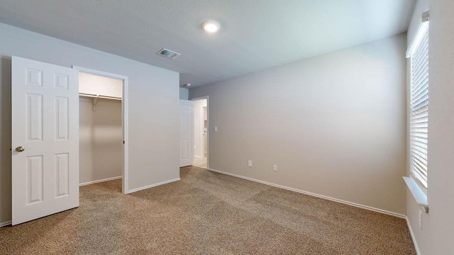 175 Rearden Blvd, Jarrell, TX 76537 - unfurnished bedroom featuring carpet, baseboards, a closet, and a spacious closet