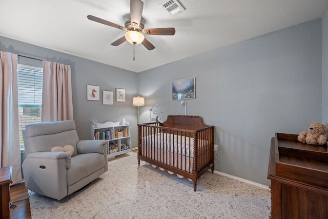 10304 Lone Pine Ln, Austin, TX 78747 - bedroom featuring a crib and a ceiling fan