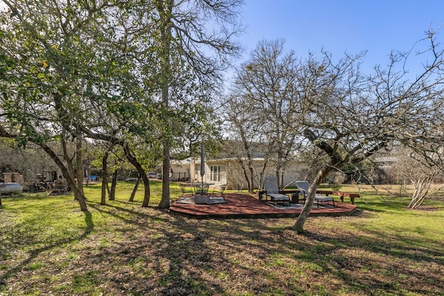 9300 N Madrone Trl, Austin, TX 78737 - view of grassy yard featuring a deck