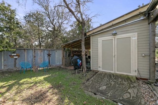 9300 N Madrone Trl, Austin, TX 78737 - view of yard with a storage unit