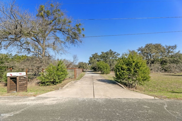 9300 N Madrone Trl, Austin, TX 78737 - view of concrete driveway