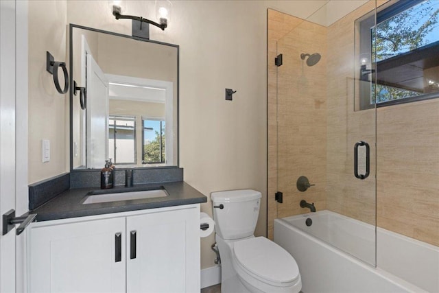 1405 Parkinson Dr, Austin, TX 78704 - full bathroom with healthy amount of natural light, toilet, vanity, and  shower combination