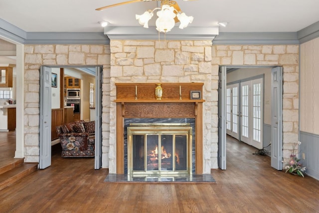 27846 Natural Bridge Caverns Rd, San Antonio, TX 78266 - unfurnished living room featuring a large fireplace and wood finished floors