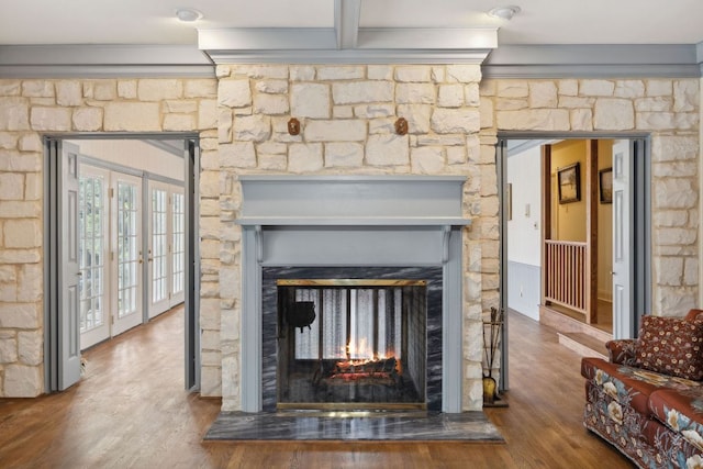 27846 Natural Bridge Caverns Rd, San Antonio, TX 78266 - detailed view of a multi sided fireplace, wood finished floors, crown molding, and french doors