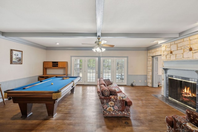 27846 Natural Bridge Caverns Rd, San Antonio, TX 78266 - game room with beamed ceiling, a stone fireplace, wainscoting, ceiling fan, and billiards