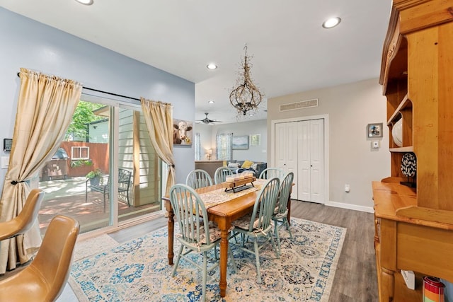 810 Monterrey St, Lockhart, TX 78644 - dining space featuring wood finished floors, recessed lighting, a chandelier, and baseboards
