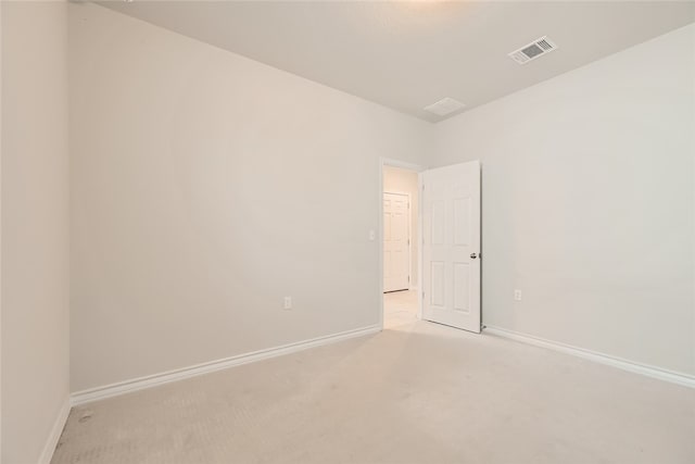 2009 Jacey Way, Austin, TX 78725 - empty room featuring baseboards and light carpet