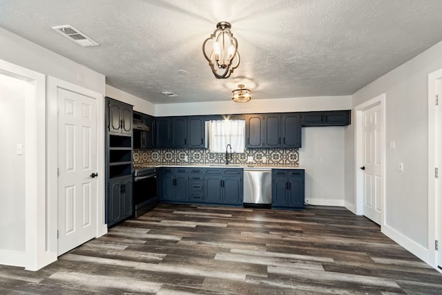 220 E Belton Ave, Rockdale, TX 76567 - kitchen with stainless steel appliances, dark wood-type flooring, a textured ceiling, a sink, and light countertops