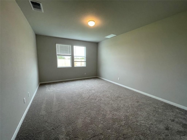 2460 Walking Y Rd, Georgetown, TX 78633 - carpeted spare room with baseboards