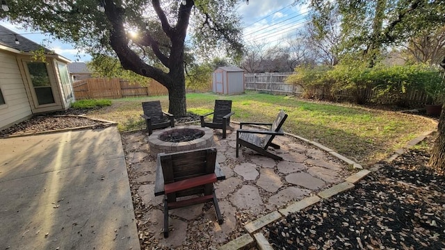 1002 Boxwood Loop, Georgetown, TX 78628 - view of patio / terrace with an outdoor fire pit