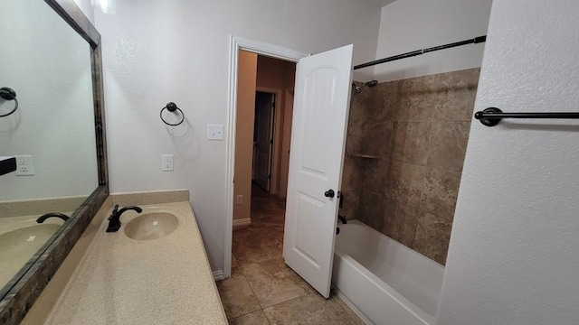 1002 Boxwood Loop, Georgetown, TX 78628 - bathroom with tile patterned floors, vanity, and bathtub / shower combination
