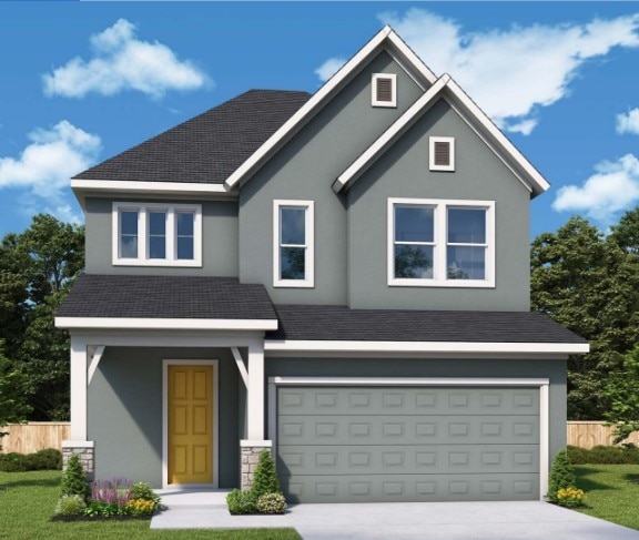 1412 S Brook Dr, Leander, TX 78641 - view of front facade featuring an attached garage, driveway, and stucco siding