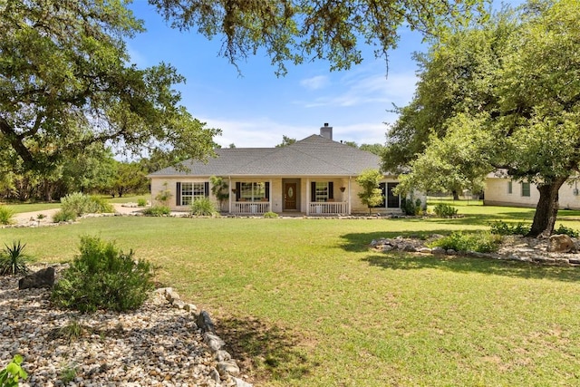 14717 Crosscreek Dr, Austin, TX 78737 - ranch-style house featuring covered porch, a front yard, and a chimney