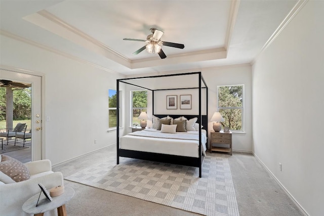 14717 Crosscreek Dr, Austin, TX 78737 - carpeted bedroom featuring a tray ceiling, crown molding, baseboards, access to outside, and a ceiling fan