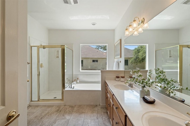 14717 Crosscreek Dr, Austin, TX 78737 - bathroom featuring a garden tub, double vanity, and a shower stall