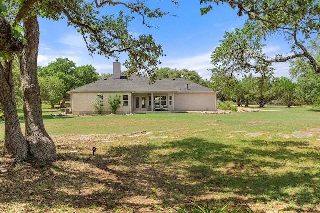 14717 Crosscreek Dr, Austin, TX 78737 - back of house with a chimney and a yard