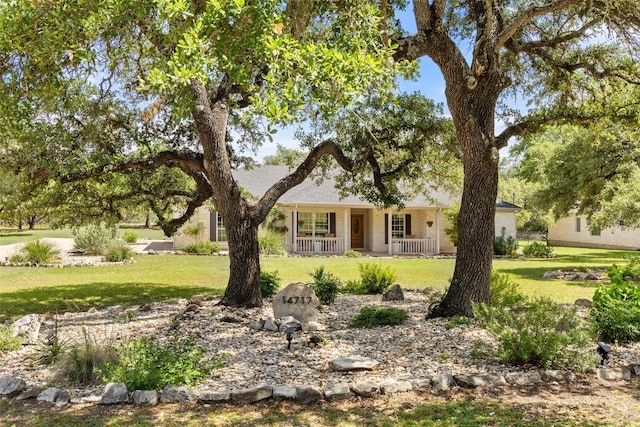 14717 Crosscreek Dr, Austin, TX 78737 - single story home featuring a porch and a front yard