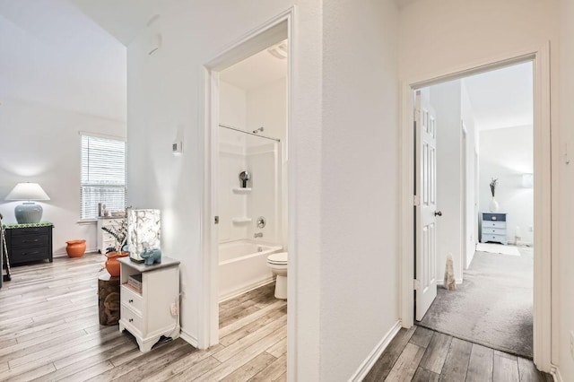 1521 W Kerr Pass, Leander, TX 78641 - corridor featuring light wood-type flooring and baseboards