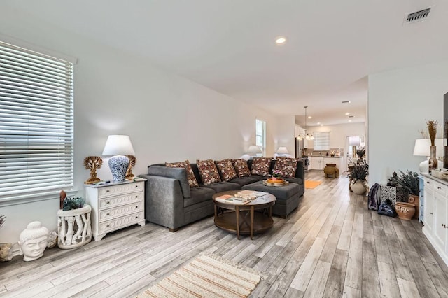 1521 W Kerr Pass, Leander, TX 78641 - living area featuring light wood finished floors and recessed lighting
