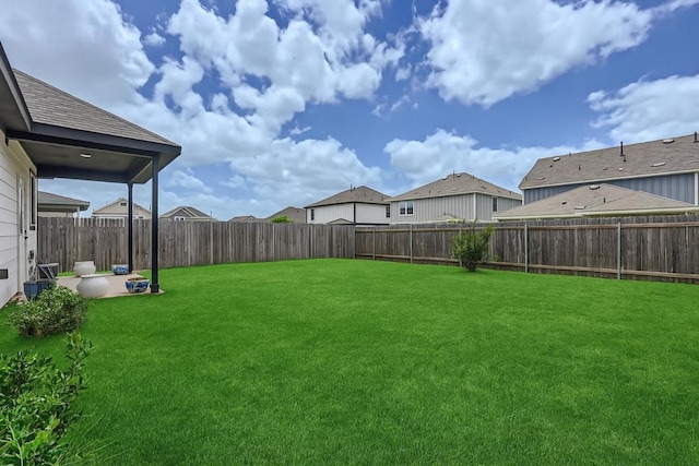 1521 W Kerr Pass, Leander, TX 78641 - fenced backyard with a patio area and a residential view