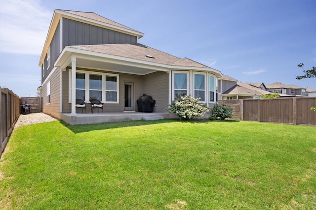 400 Turnbuckle Bnd, Leander, TX 78641 - rear view of house featuring a fenced backyard and board and batten siding