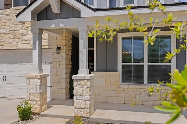400 Turnbuckle Bnd, Leander, TX 78641 - doorway to property with board and batten siding, stone siding, and a porch