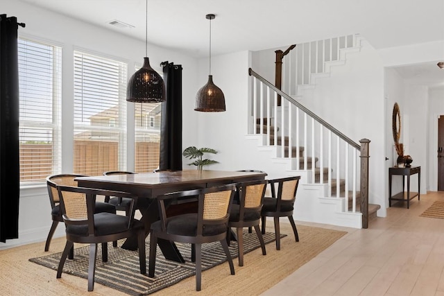 400 Turnbuckle Bnd, Leander, TX 78641 - dining space featuring plenty of natural light, stairs, and light wood-style floors