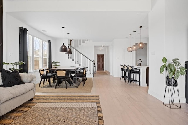 400 Turnbuckle Bnd, Leander, TX 78641 - dining room with stairs and light wood-style floors