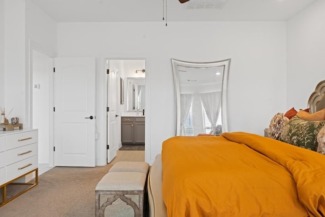 400 Turnbuckle Bnd, Leander, TX 78641 - bedroom with light colored carpet and ensuite bath