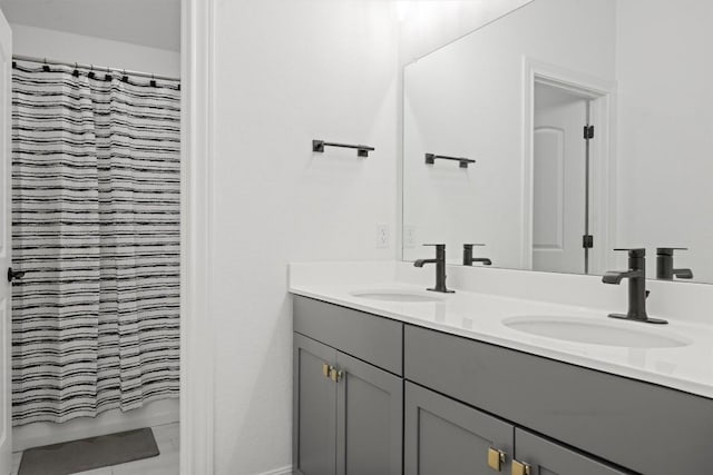 400 Turnbuckle Bnd, Leander, TX 78641 - full bath with double vanity, curtained shower, and marble finish flooring