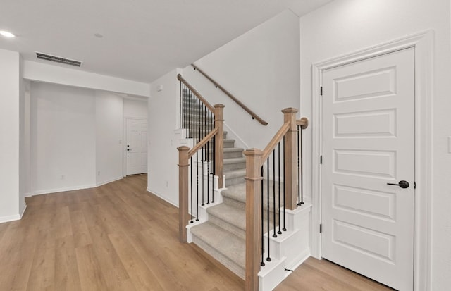 2725 Woodall Dr Unit 1601, Cedar Park, TX 78613 - staircase featuring wood finished floors and baseboards