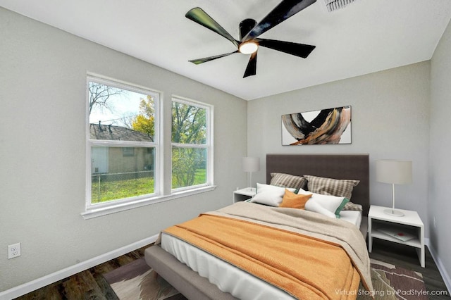 212 Walnut Ave, Luling, TX 78648 - bedroom featuring wood finished floors and ceiling fan