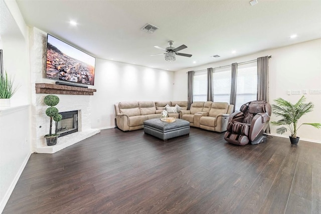 1224 Euless Ln, Leander, TX 78641 - living room featuring ceiling fan, dark wood finished floors, baseboards, a brick fireplace, and recessed lighting