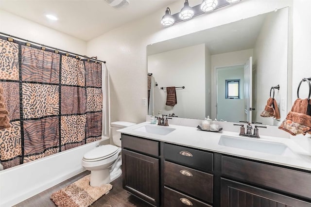 1224 Euless Ln, Leander, TX 78641 - full bath featuring double vanity, shower / bath combination with curtain, and wood finished floors