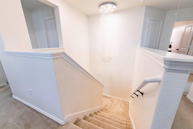 1224 Euless Ln, Leander, TX 78641 - staircase with carpet floors and a chandelier