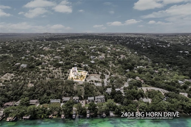 2404 Big Horn Dr, Austin, TX 78734 - aerial view of property and surrounding area with property boundaries highlighted