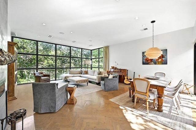 1700 S 6th St, Austin, TX 78704 - living room featuring recessed lighting, floor to ceiling windows, and a glass covered fireplace