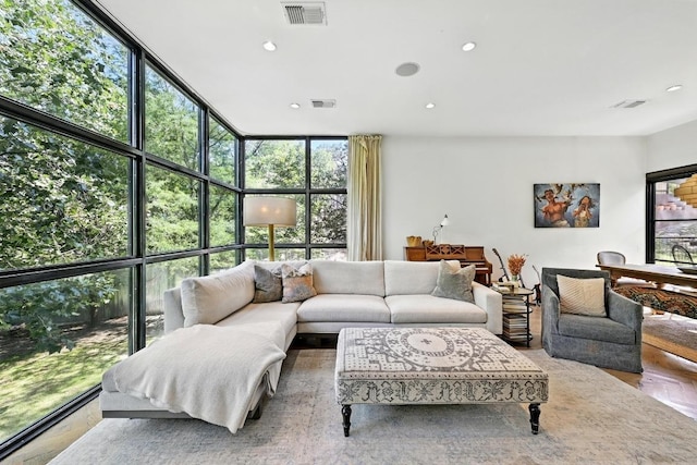 1700 S 6th St, Austin, TX 78704 - living room with healthy amount of natural light, recessed lighting, and a wall of windows