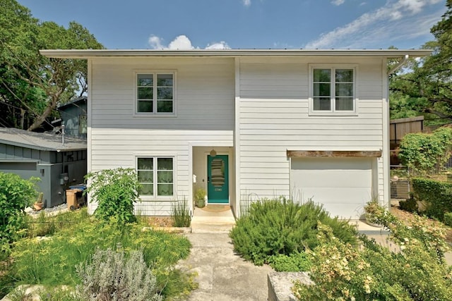 1700 S 6th St, Austin, TX 78704 - view of front facade featuring a garage