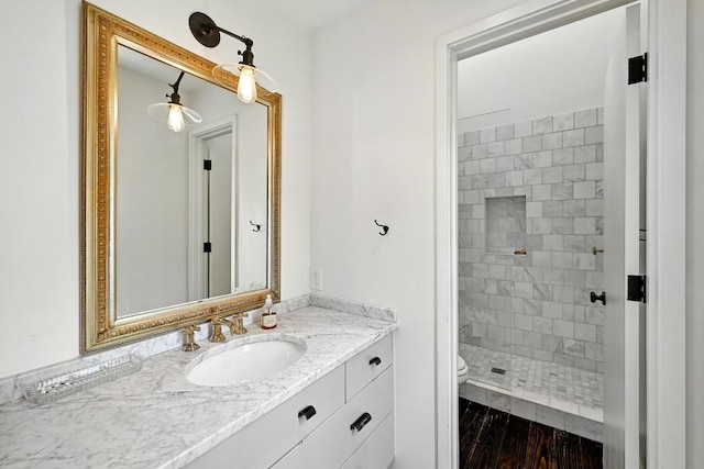 1700 S 6th St, Austin, TX 78704 - bathroom featuring vanity, toilet, and a shower stall