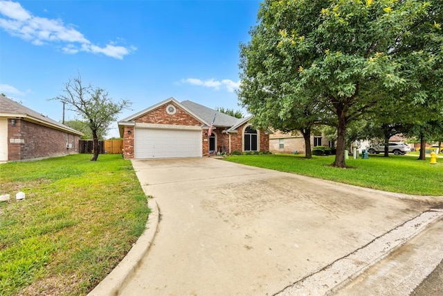 1907 Merlin Dr, Harker Heights, TX 76548 - view of front of home with a garage, brick siding, and driveway