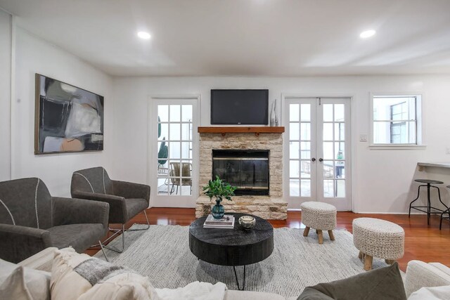 1005 Salem Ln, Austin, TX 78753 - living room with plenty of natural light, wood finished floors, and recessed lighting
