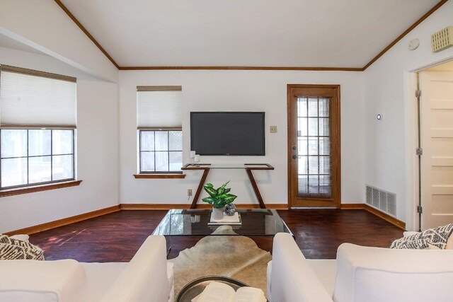 1005 Salem Ln, Austin, TX 78753 - living area featuring wood finished floors, vaulted ceiling, baseboards, and crown molding