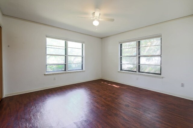 1005 Salem Ln, Austin, TX 78753 - empty room featuring healthy amount of natural light, wood finished floors, and ceiling fan