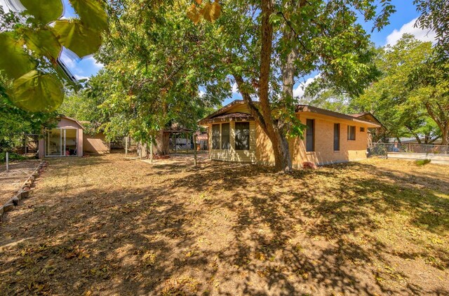 1005 Salem Ln, Austin, TX 78753 - view of yard with a sunroom