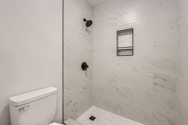 7103 Treasure Cv Unit B, Austin, TX 78745 - bathroom with tiled shower and toilet