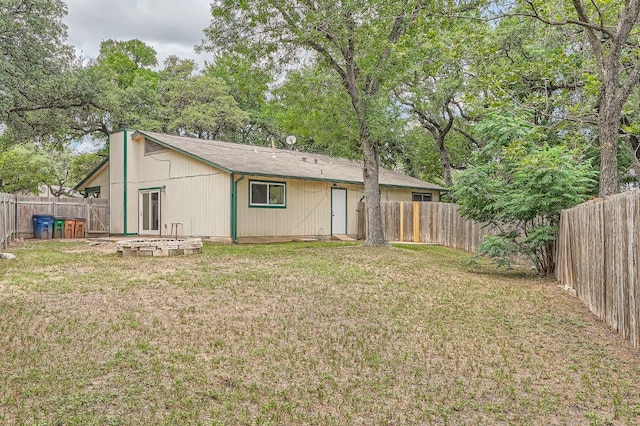 7103 Treasure Cv Unit B, Austin, TX 78745 - rear view of property with a fenced backyard